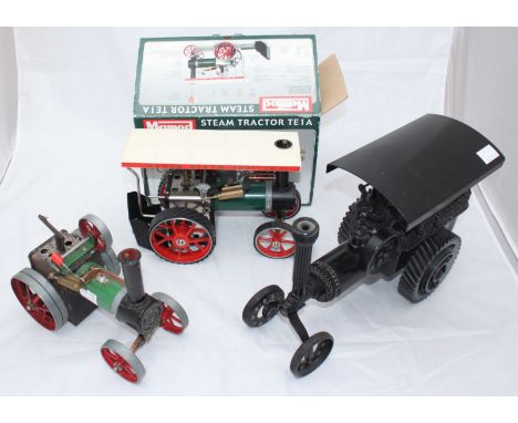 A Mamod Steam Tractor TE1A, (boxed with instructions), together with another Mamod TE1A Steam Tractor and a steam engine/ tra