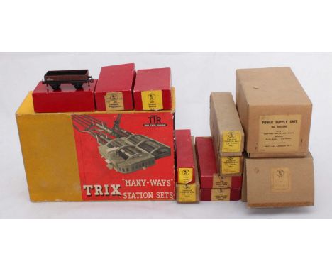 Various boxed Trix Twin Railway including Many Ways Through Station 3006, die-cast metal 39 Clock Tower, 2x Lighted Bracket 7