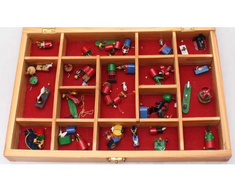 Approximately forty St.Leger dolls house automaton miniatures including sheep jumping over the bed, dentist, stork delivering