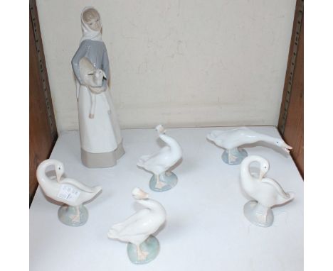SECTION 22. Six assorted Lladro porcelain figures, one a young girl holding a lamb, the other five of geese.