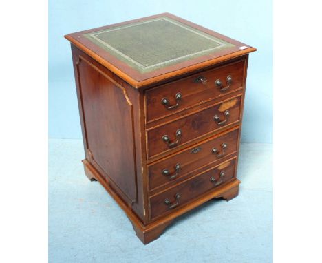 A 20th century walnut filing cabinet of two deep drawers, the top with silver gilt tooled, green leather scribe and raised on