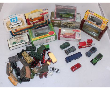 A Matchbox Team Convoy TNT two lorry pack, Corgi Classics 66501 German Army Tiger Mk1 Tank and two Lledo Trackside vans (all 