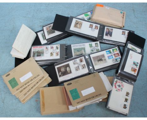 A collection of approximately 300 first day covers across five albums and several envelopes.