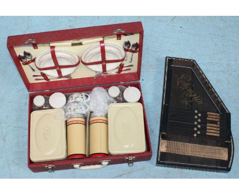 A Brexton polka dot picnic hamper together with a Sohengun 32-string table harp / zither (three strings lacking)