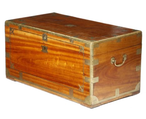 A 19th century camphorwood and brass mounted trunk, with a sunken brass ring handle and side carrying handles, 44cm high, 88c