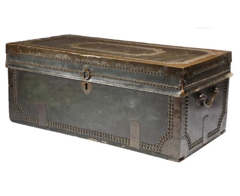 A 19th century Chinese green leather and camphorwood trunk, with brass mounts and studded decoration, with a pink paper lined