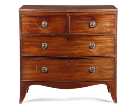 A Regency mahogany bowfront chest, the top with a reeded edge above two short and two long drawers and on French bracket feet
