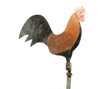 A folk art painted metal weather vane, in the form of a cockerel, 63.5cm high, 48.9cm wide.