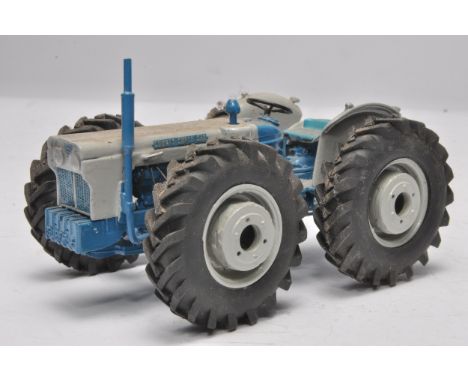 Scaledown 1/32 handbuilt farm model issue comprising County Super 6 Tractor. Displayed, would benefit from a clean and may ha