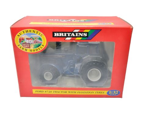 Britains farm model issue comprising 1/32 Ford 8730 Tractor with Flotation Tyres (9442), appears excellent and secure in orig