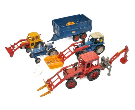 A varied group of Britains Farm Models including tractor and implement issues as shown.