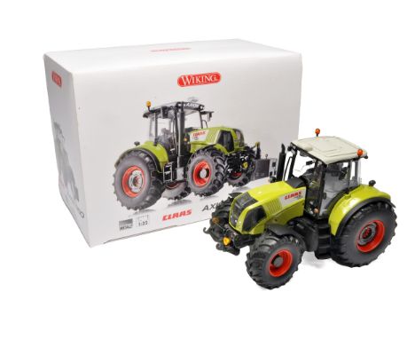 Wiking 1/32 farm model issue comprising Claas Axion 850 tractor. Appears to be without notable fault in original packaging an
