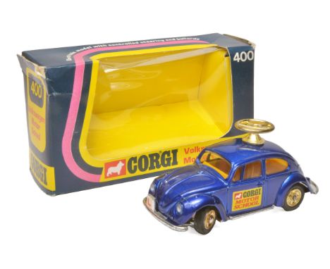 Corgi No. 400 Volkswagen 1200 "Motor School" Car. Blue body, yellow interior, gold cast hubs and gold roof steering wheel. Di