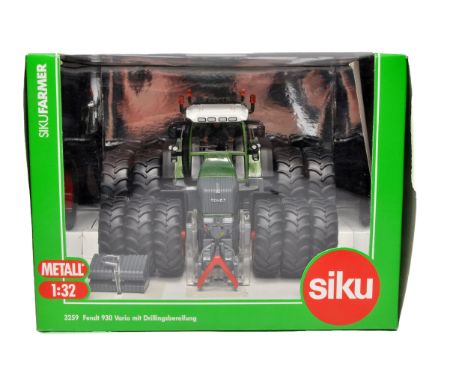 Siku farm model issue comprising 1/32 Fendt 930 Vario Triple Wheeled Tractor. Excellent and secure in original packaging and 