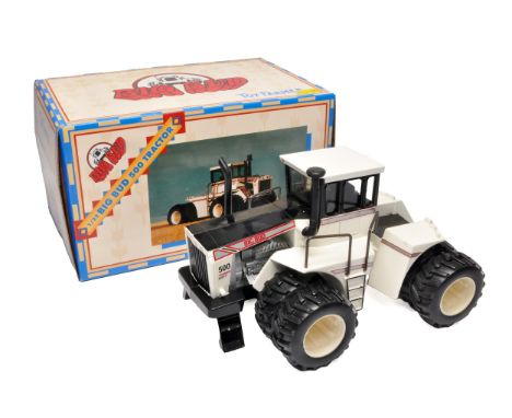 Ertl 1/32 farm model issue comprising Toy Farmer Big Bud 500 Tractor, excellent in original packaging and box.