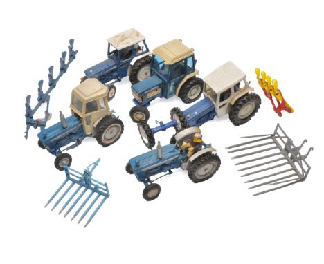 A group of various Ford tractor issues from Britains (mostly), the odd conversion. All displayed, would benefit from a clean 