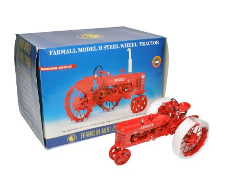 Franklin Mint 1/12 farm model issue comprising Farmall Model H Steelwheel Tractor in original packaging and box (storage wear