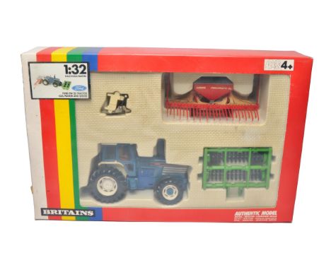 Britains farm model issue comprising 1/32 Ford TW25 Tractor, Coil Packer and Seeder Set (9641), looks to be without notable f