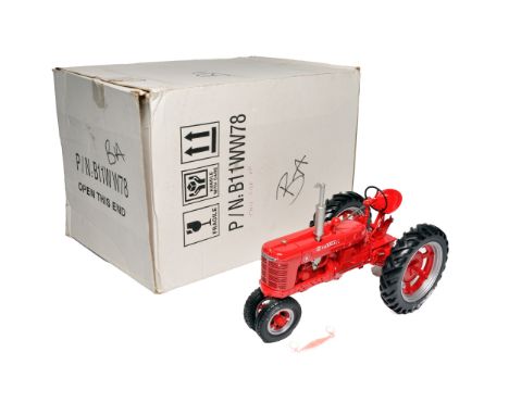 Franklin Mint 1/12 farm model issue comprising Farmall Tractor in original packaging. Light fitting loose - model has been di