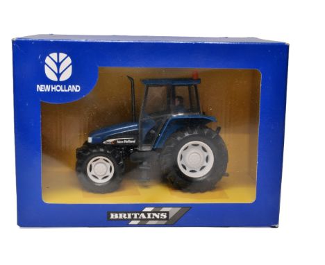 Britains farm model issue 40580 comprising New Holland TD95D Tractor. Excellent and secure in original packaging and box.