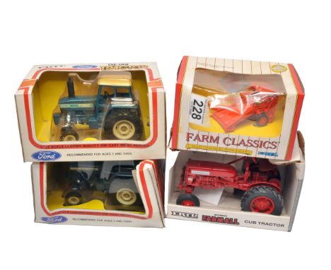 Group of 1/32 farm models comprising Ford TW-20 plus Ford TW-15 both look to have not been removed -storage wear to boxes. Al