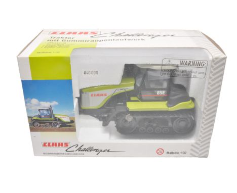Norscot 1/32 farm model issue comprising Claas Challenger 85E Tractor. Excellent and secure in original box.