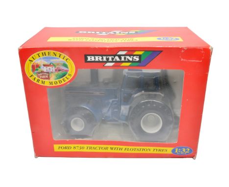 Britains farm model issue comprising 1/32 Ford 8730 Tractor with Flotation Tyres (9442), appears excellent and secure in orig