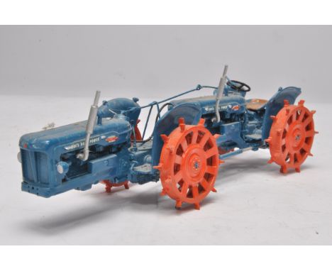 Megs Models or similar 1/32 handbuilt farm model issue comprising Fordson Doe Dual Drive Tractor on metal wheels. Displayed, 