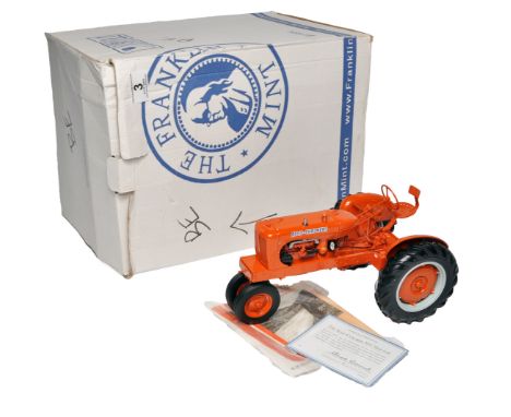 Franklin Mint 1/12 farm model issue comprising Allis Chalmers WC Tractor in original packaging. Looks to be complete (some ac