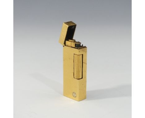 A Dunhill gold plated Cigarette Lighter, leaf design, with original slip case, booklet, guarantee card dated 2001 and present