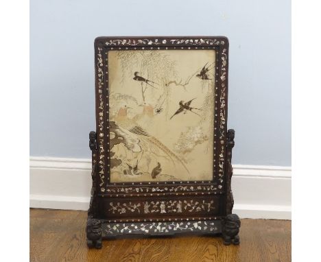 A 19thC Chinese mother of pearl inlaid hardwood Table Screen,&nbsp;the hardwood frame carved with dogs of foo and inset with 