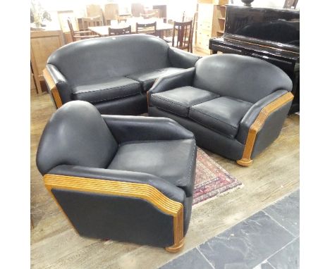 An Art Deco style black leatherette Three Piece Suite, with reeded light wood arms and replacement upholstery, all 76.5cm hig