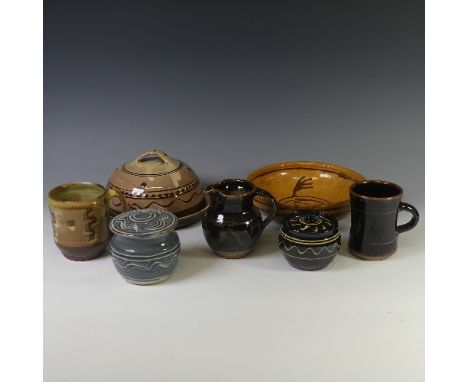 A small quantity of Winchcombe Pottery Wares, to include two Mugs, one by Patrick Groom, two Lidded Pots and Jug, all with im