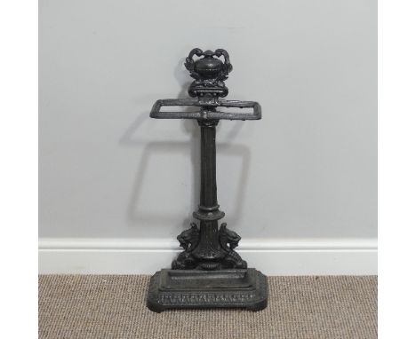 A Victorian-style cast iron Stick Stand, the central column flanked by lions beneath a laurel encrusted urn, W 34cm x D 18cm 