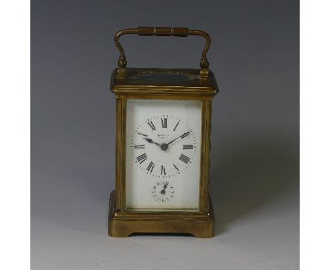 A 19th century French gilt-brass Carriage Clock with alarm, of traditional five-glass form, the two barrel movement striking 