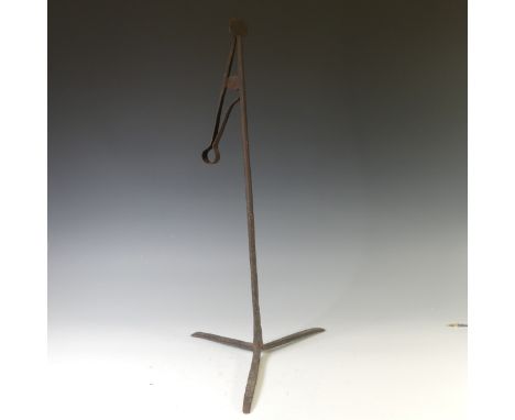 An antique wrought iron 'Pearman' Lamp or Rushnip, with cylindrical stem, on tripod base, H 62cm. 