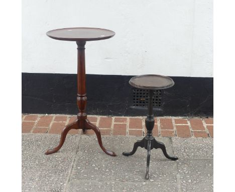 A Georgian mahogany tripod Table, with circular top raised above a turned column on tripod base, W 42cm x D 42cm x H 74cm, to