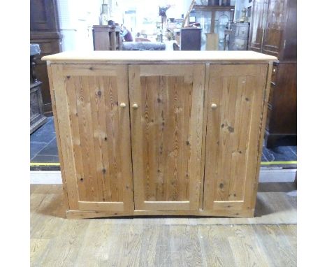 A vintage pine Cupboard/ low Wardrobe, with one large and one small cupboard with turned wood handles, W 139cm x D 52cm x H 1
