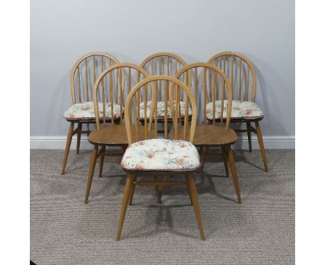 A set of six vintage Ercol hoop back Dining Chairs, with upholstered cushions, stamped to the underside with kitemark and dat