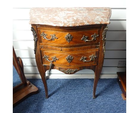 An early 20thC French kingwood bombe Commode, the marble top upon two crossbanded drawers, all fitted with ormulu mounts, all