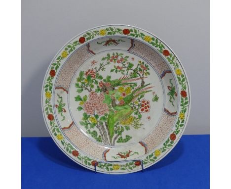 A Chinese porcelain famille rose Bowl, the central panel decorated with birds in a naturalistic setting, with scale border, c