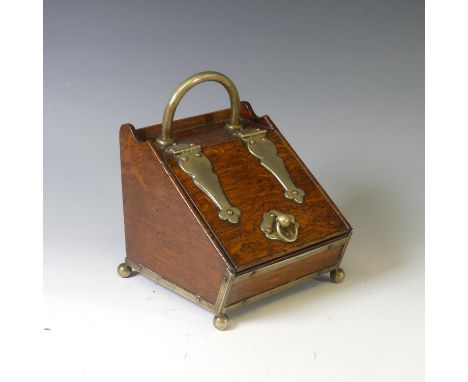 An Edwardian oak Tea Caddy, modelled as a miniature coal scuttle, W 15cm x H 20cm x D 17cm. 