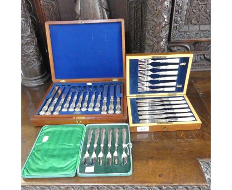 Two cased sets of silver plated Cutlery, one with lift out tray and the other with mother of pearl handles, together with a c