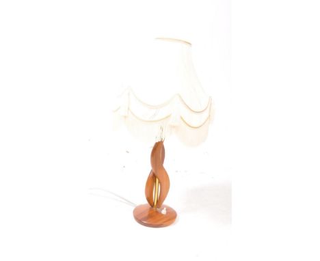 British Modern Design - A mid 20th century circa 1960s teak table lamp. The lamp having double S in teak to shaft and a cream