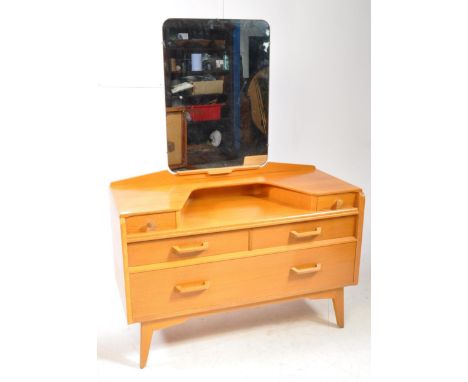G Plan - Brandon - A mid 20th century circa 1960s G-Plan Brandon range light oak dressing table. The dressing table having tr