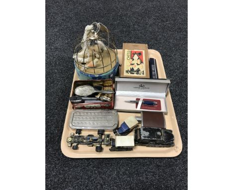 A tray of mid 20th century musical bird cage, pens, hip flask, die cast cars, Rolls Razor, lighters etc 