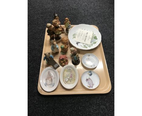 A tray containing three Hummel figurines, assorted Peter Rabbit dishes, Beswick figure of Tom Kitten as found, together with 