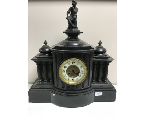 A Victorian slate mantle clock with gilt and enamel dial