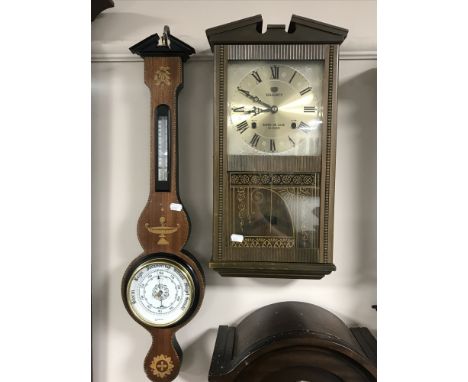 A contemporary gold time Italian barometer and a Majesty 31 day wall clock  