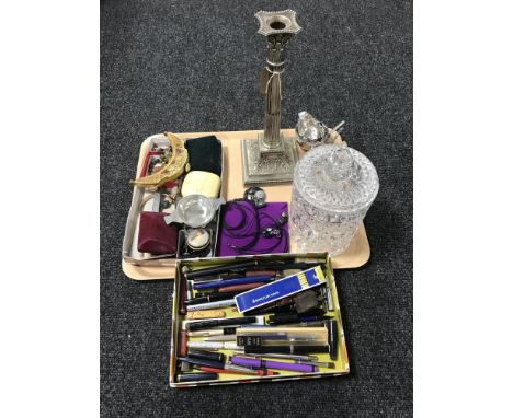 A tray containing a cut glass lidded biscuit barrel, together with a four piece cruet set on plated stand, a plated sugar bas